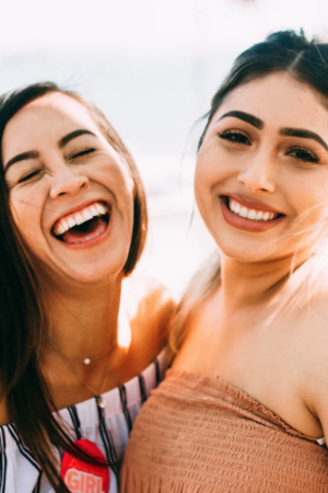 Two women laughing